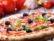 Menu maxi pizza o calzone con vino o birra per 2 o 4 persone al  (sconto fino a 51%)