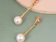 Orecchini pendenti decorazione di perle finte