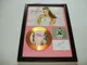 gold disc frames Ariana Grande Disco d'oro Firmato