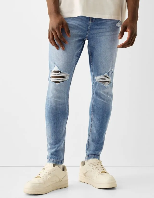 Bershka Jeans Carrot Fit Strappati Uomo 42 (Eu 36) Azzurro Lavato