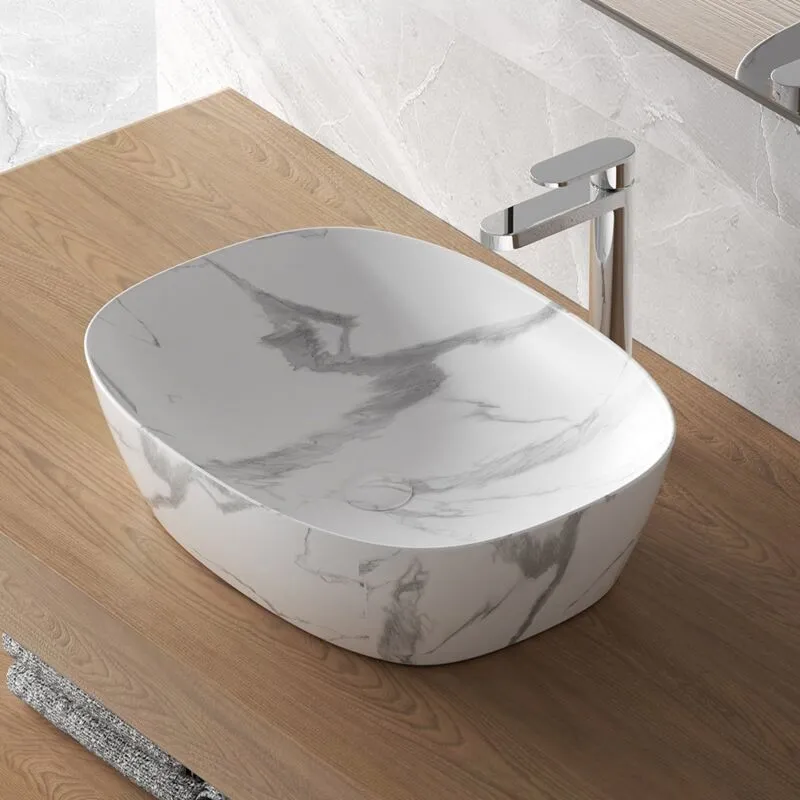 Inbagno - Lavabo da appoggio ovale 50x38 cm effetto marmo bianco Tokyo