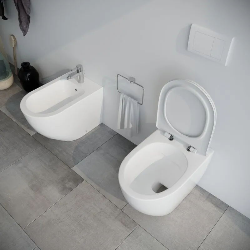 Sanitari bagno Bidet e Vaso wc a terra filomuro rimless in ceramica con sedile coprivaso softclose Fast