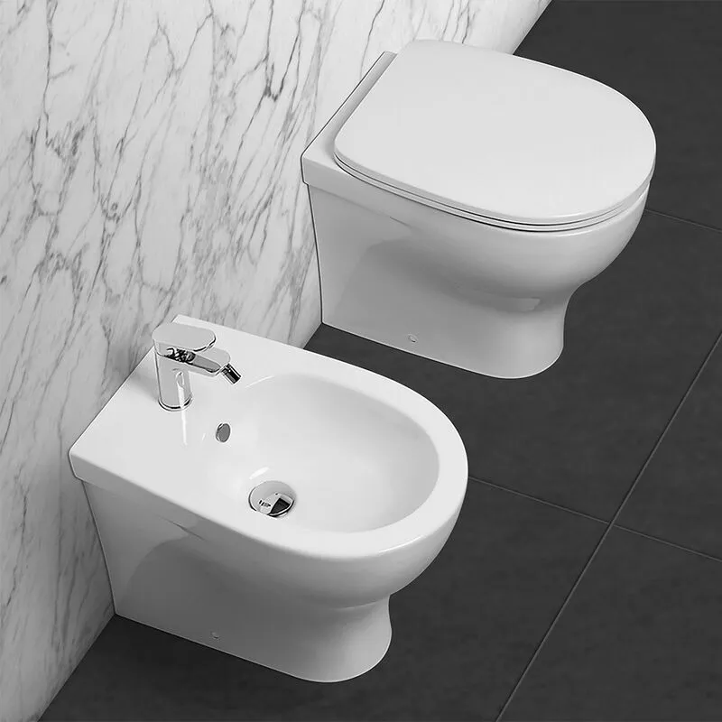 Inbagno - Sanitari filo muro traslati rimless Azzurra Pratica con sedile rallentato