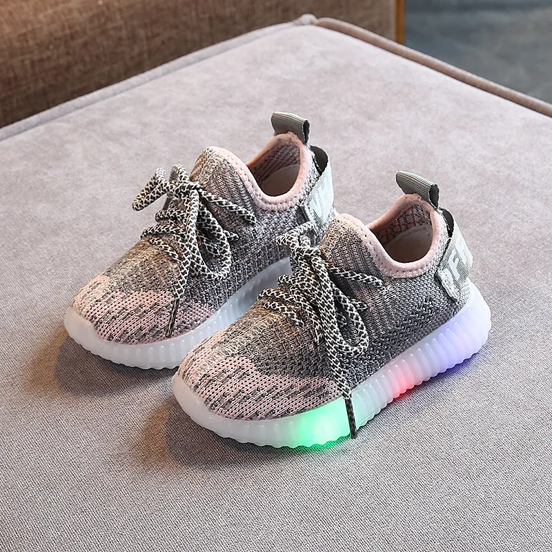 Sneakers casual unisex in tessuto a rete traspirante Soft suola LED
