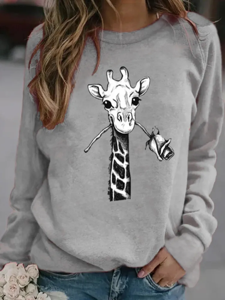 T-shirt da donna manica lunga casual con stampa giraffa cartone animato o-collo
