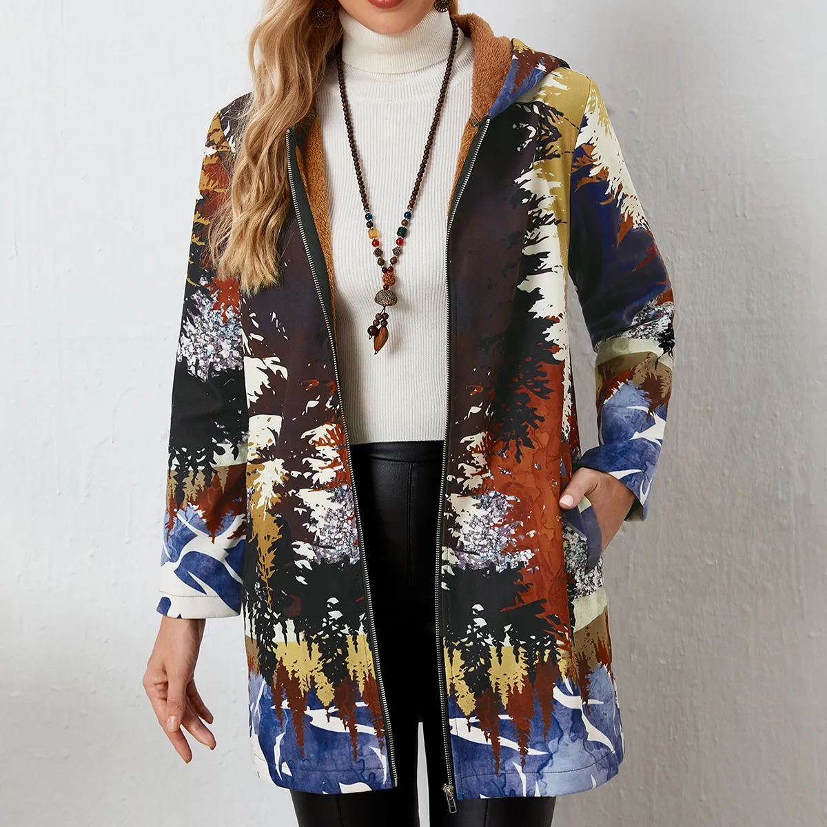 Cappotto con cappuccio con stampa albero con zip