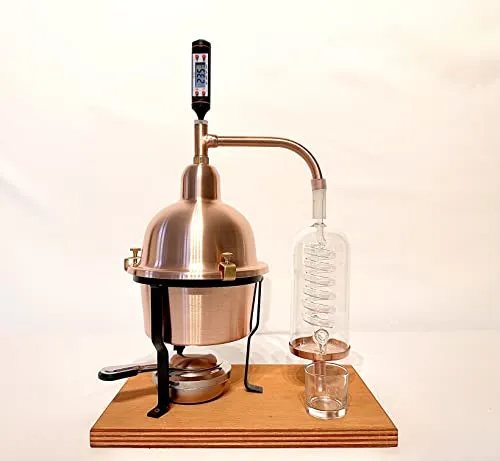 Alambicco Distillatore per oli essenziali in rame con serpentina di condensazione in vetro