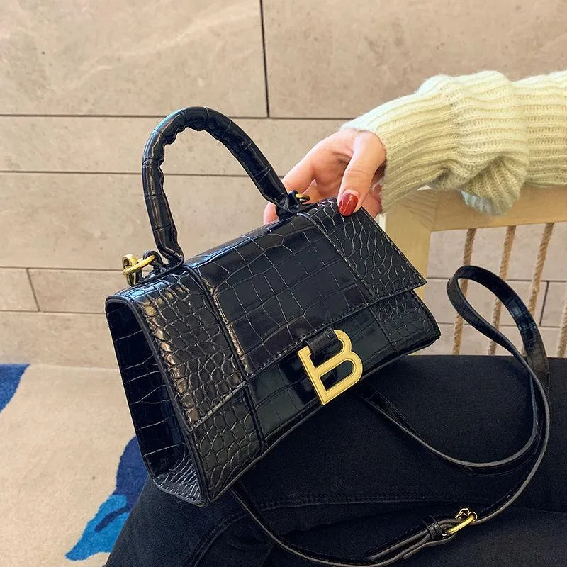 Borsa da donna borsa a clessidra 2021 nuova borsa da donna borsa da studente borsa a tracolla portatile borsa a tracolla piccola borsa quadrata tinta