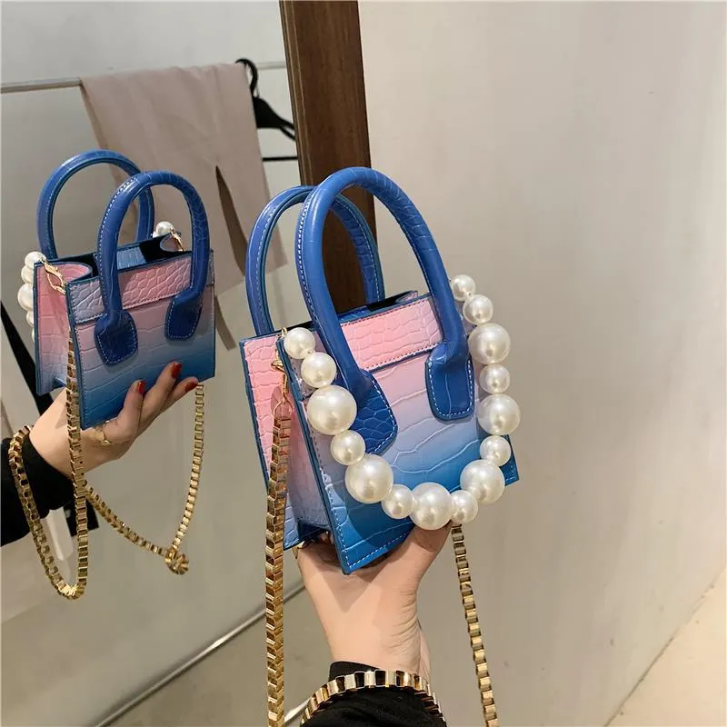 Borse borse nuovo stile 2021 primavera nuovo stile versione coreana PU borsa da donna colore puro piccola borsa quadrata perle borse transfrontaliere