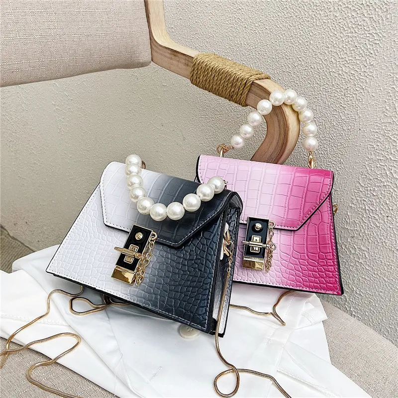 Borsa ascellare donna 2020 popolare nuova moda trendy perla borsa messenger portatile stile occidentale baguette monospalla