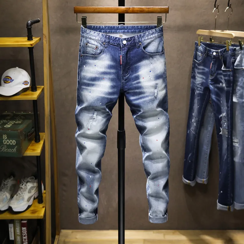 Jeans da uomo dipinti a mano con vernice lavata bianca elasticizzata jeans slim fit da uomo alla moda