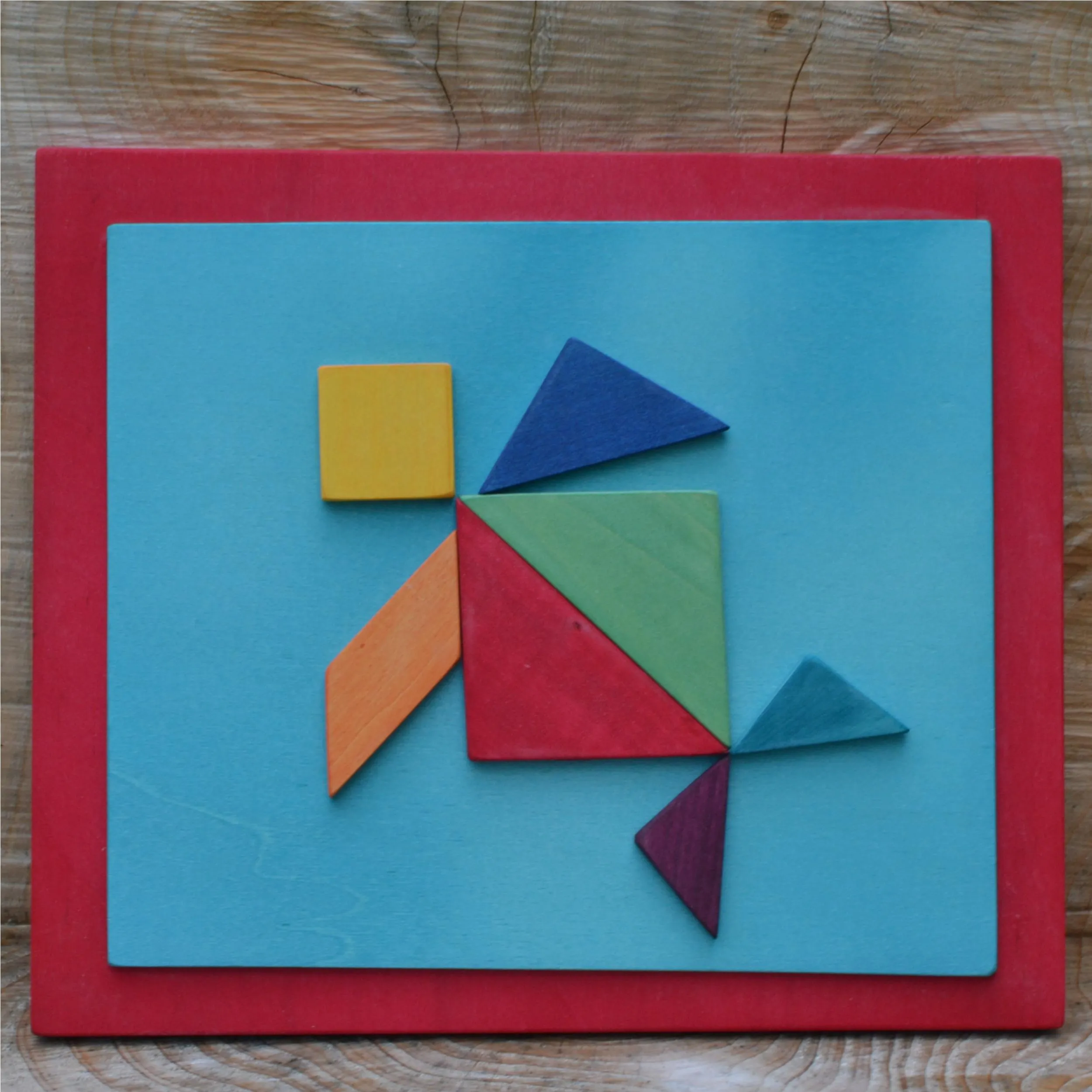 Quadro Tangram tartaruga 24x28x1,6 cm orizzontale pannello in legno colore Rosso i pezzi sono attaccati ed incollati con 7 pezzi del Tangram si possono fare infinite figure